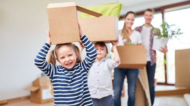 Pictured of kids playing with moving boxes