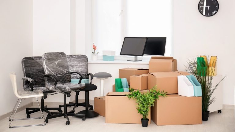 Picture of home office packed into boxes, wrapped