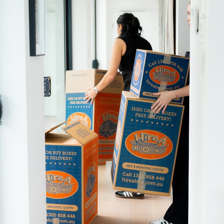 image of packers stacking finished boxes