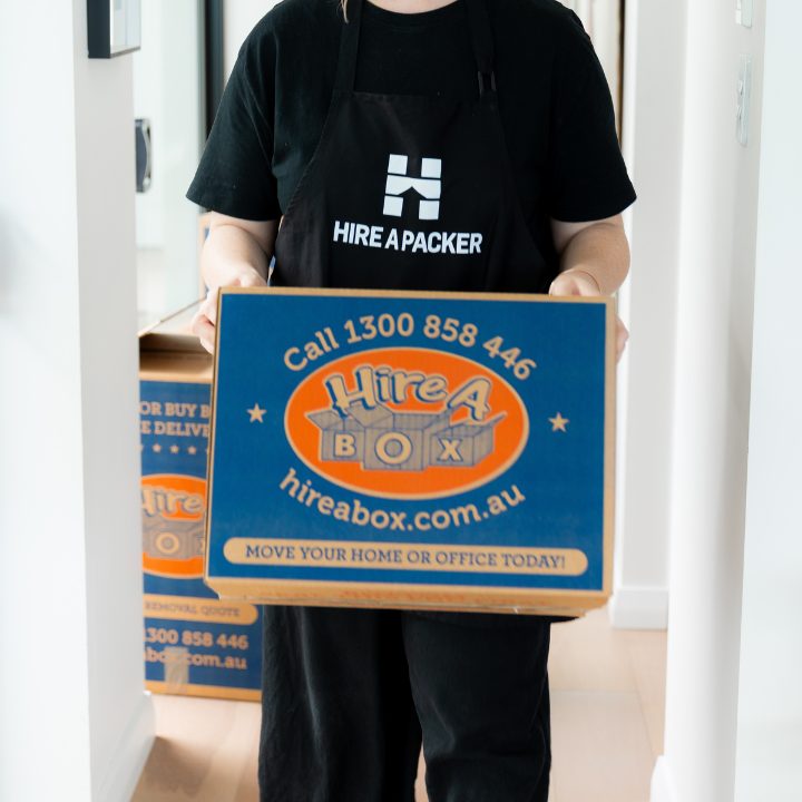 Image of packer holding box